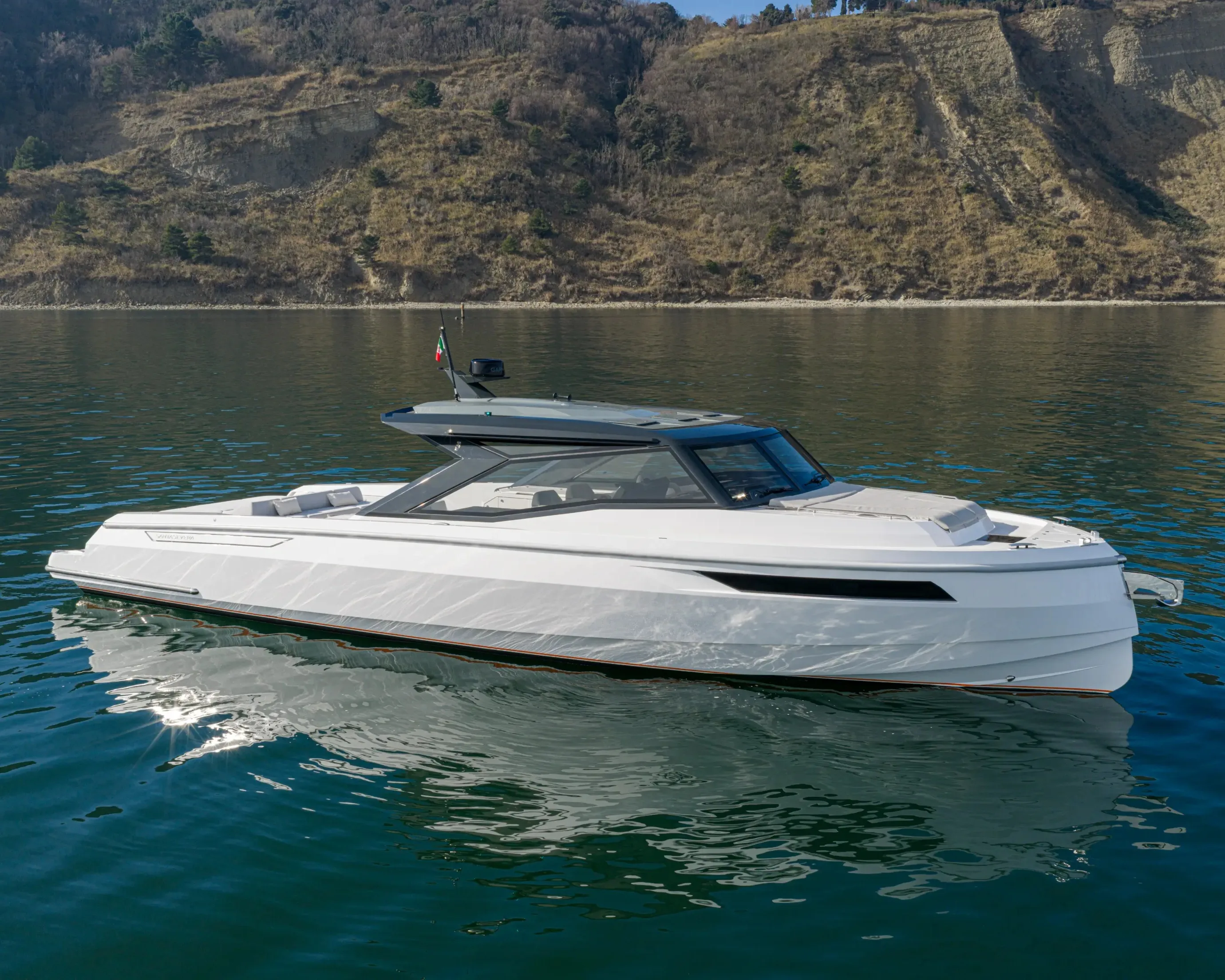 Santasevera 52 profile shot at anchor in Mediterranean bay, clean side-on view