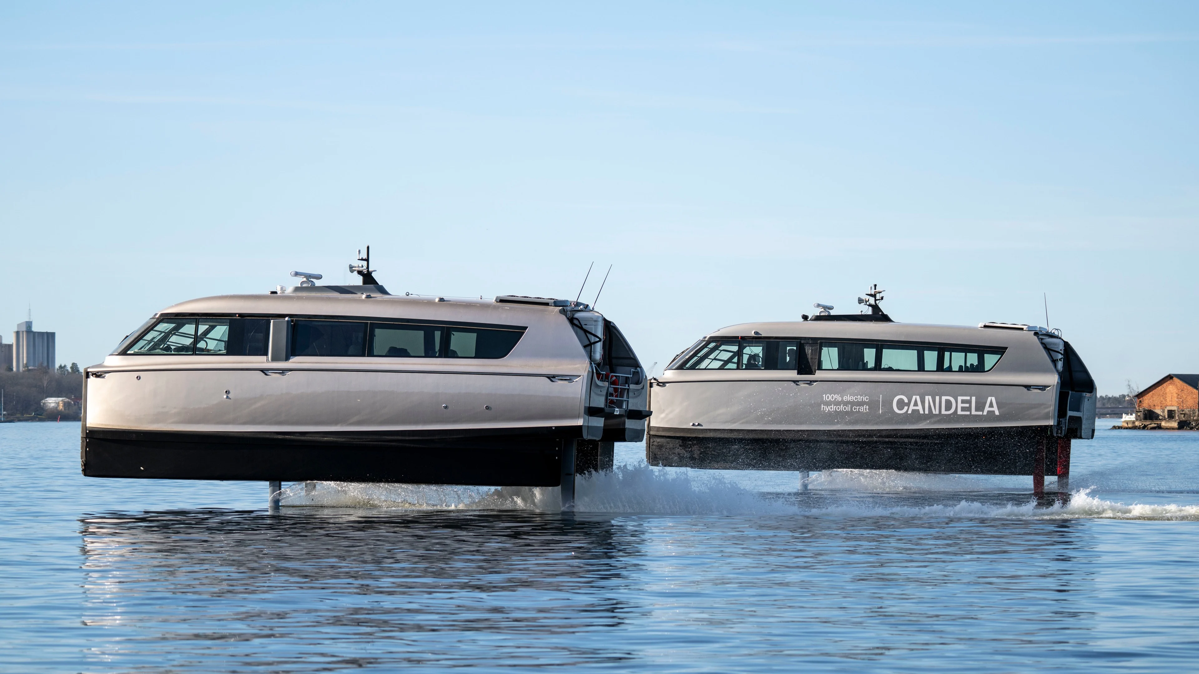 Candela Boats & Ferries P-12 electric hydrofoil passenger ferry flying above the water.