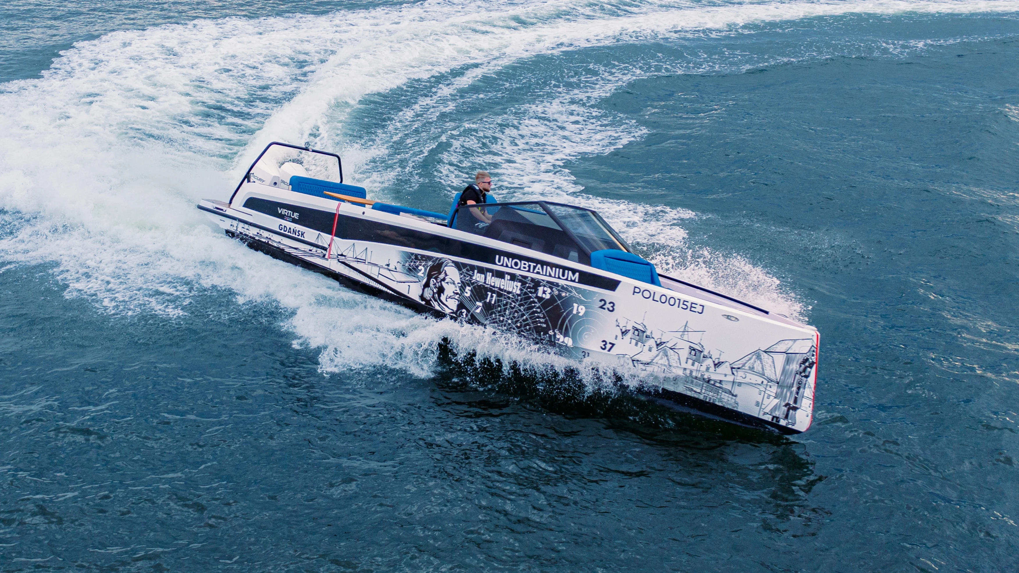 Virtue Yachts V10 Open performance dayboat underway with open cockpit.