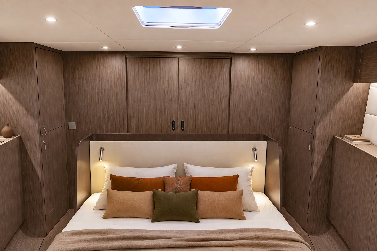 YYachts Y6 owner's cabin with a double bed and timber panelling